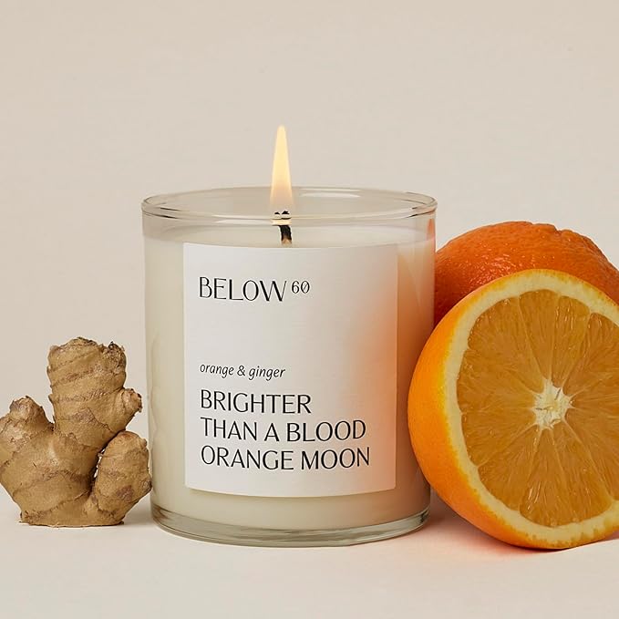 Hilary Duff’s Below 60 Scented Candle | Brighter Than A Blood Orange Moon | Essential Oil-Based | Hand-Made with Paraffin-Free Soy Wax | 100% Cotton Wick | 50 hr Burn Time | Orange & Ginger (10oz)