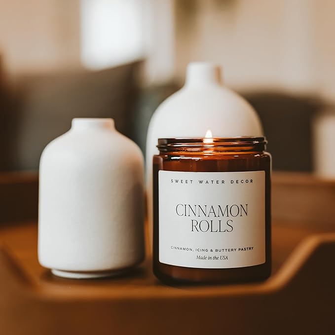 Sweet Water Decor Cinnamon Roll Candle - Fall Candle with Cinnamon, Icing & Buttery Pastry for Home - Soy Candles with 40 Hours Burn Time - 9Oz Black Lid Amber Jar Holiday Scents